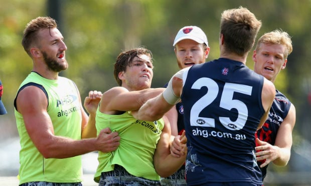 Jack Viney and Tom McDonald battle at Melbourne training on Tuesday - ${keywords}